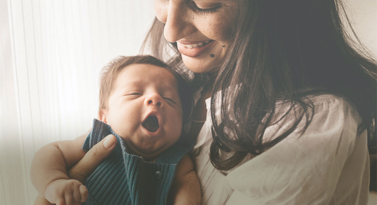 Woman holding infant